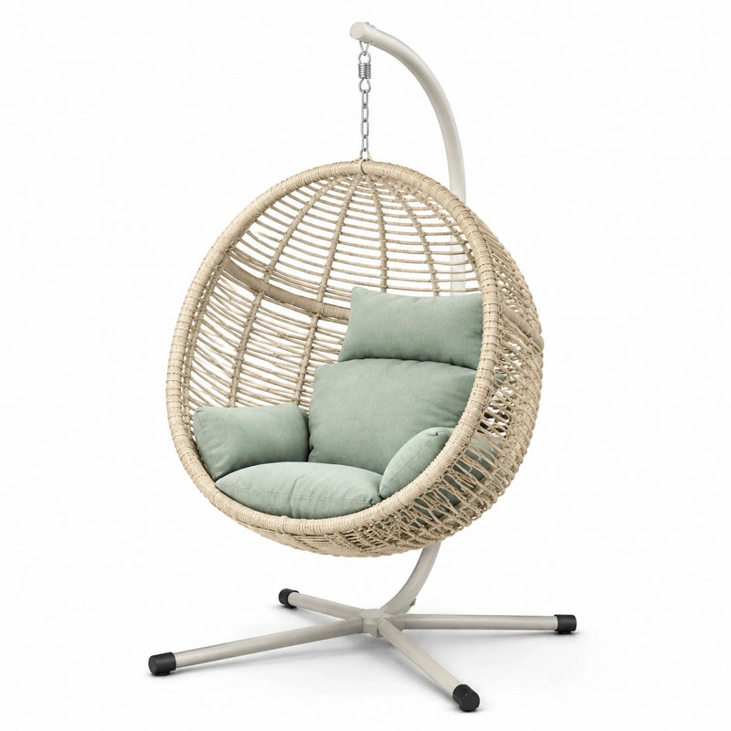 Poltrona sospesa in rattan con supporto in acciaio e cuscini verde menta